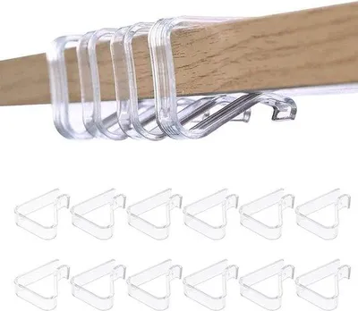 Produktbild von Unyqoos® 12er‑Set transparente Tischdeckenklammern aus ABS – 4,8×3,8×1,5 cm, hält Tischdecken fest (für Tischstärken 2–3,5 cm), für Innen & Außen