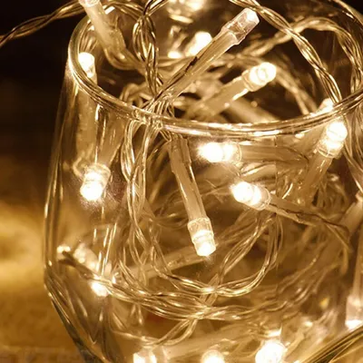 Produktbild von Eikuavons Lichterketten 100 m mit 400 LED, Warmweiß, 8 Modi, IP44, 31 V, weißer Ummantelung, für Weihnachten und Garten