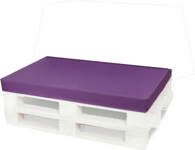 A purple cushion on a white wooden pallet, suggesting outdoor furniture.