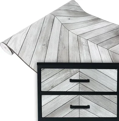 Produktbild von Klebefolie Möbel 67x100 cm - Fischgrät Grau - Selbstklebende Möbelfolie in Holzoptik - Folie für Möbel ideal zum Renovieren von Schränken, Türen und Arbeitsplatten