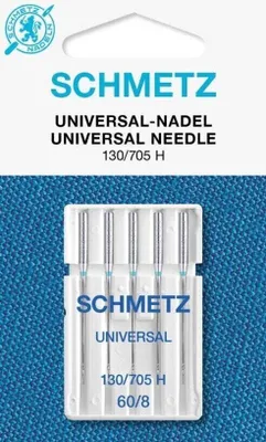 A package of Schmetz universal sewing machine needles on a textured blue background.