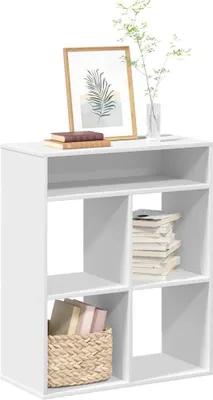 A white bookshelf with books and a vase of greenery.