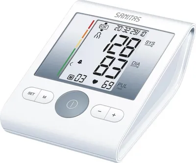 A white digital blood pressure monitor is shown from a slightly elevated front-left angle on a white background.
