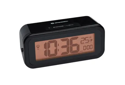 A black digital alarm clock with a copper-colored display.