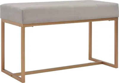 A bench with a gray upholstered seat and a gold metal frame, shown against a white background.