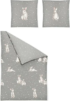 A flat lay of bedding with a rabbit pattern.