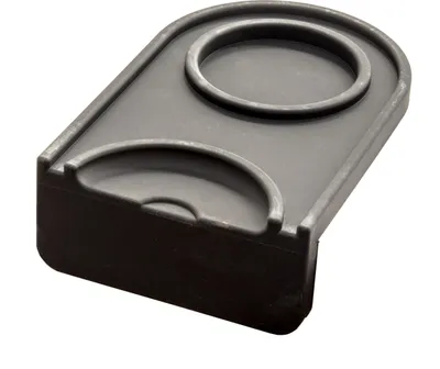A close-up shot of a coffee tamping mat.