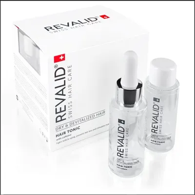 A product shot of Revalid hair tonic bottles and its packaging on a white background.