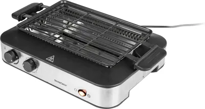 A tabletop grill on a white background.