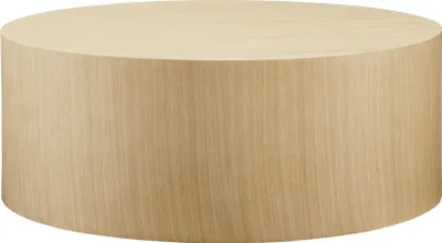 A cylindrical coffee table made of wood with a light brown oak veneer.