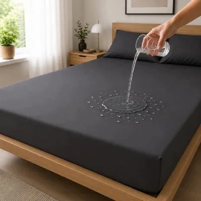 Zdjęcie produktu dla Prześcieradło wodoodporne antracyt bawełna 140X200 cm gumką łóżko