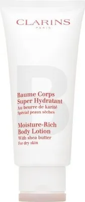 A white tube of Clarins body lotion with text and branding.