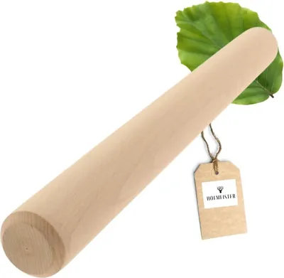 A wooden rolling pin with a green leaf and a product tag.