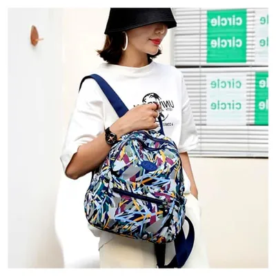 Produktbild von Damen Rucksack Klein Schultertasche Wasserdicht Nylon Cityrucksack Daypack Tagesrucksack zum Alltag Reise Schule Freizeit