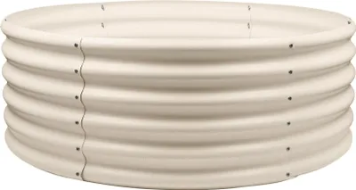 A round, corrugated metal raised garden bed.