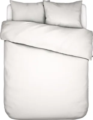 A top-down view of a white duvet and two white pillows on a bed.