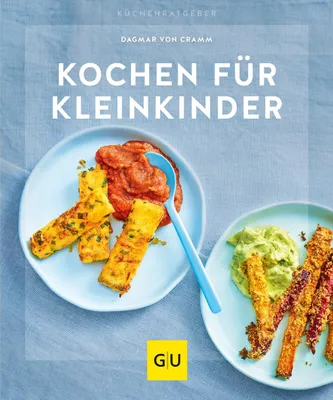 A cookbook cover featuring two plates of food, one with polenta sticks and tomato sauce, and the other with roasted carrots and avocado dip.