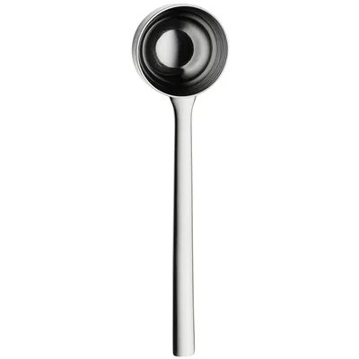 A studio shot of a silver coffee scoop against a white background.