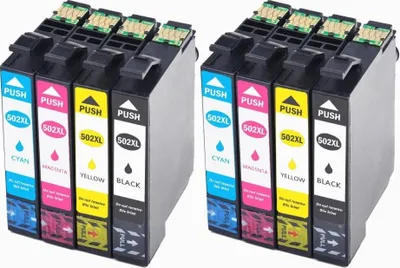 Two sets of four printer ink cartridges are displayed side-by-side against a white background.