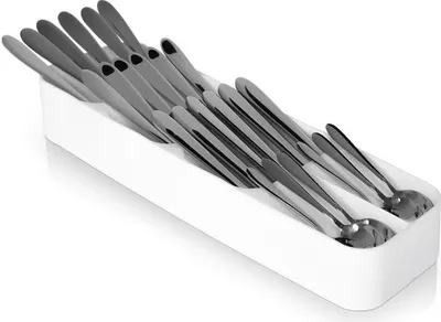 A white organizer filled with silver cutlery.