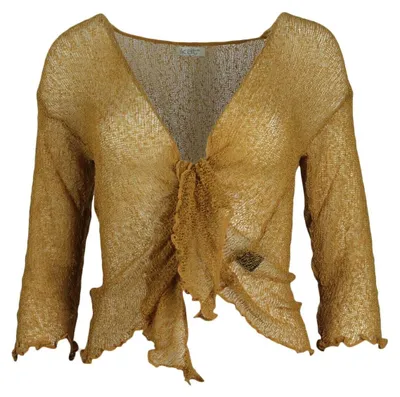 Imagen del producto de Bolero sin mangas en color dorado, elegante y cómodo