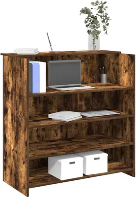 A reception desk with shelves and items on display.