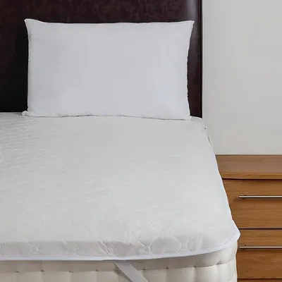 Imagen del producto de Protector para colchón Silecomplaza Mitre Essentials, acolchado, de poliéster, con bandas elásticas, funda de polipropileno, para cama individual de tamaño estándar, 100 x 200 cm, color blanco