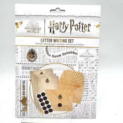 A Harry Potter letter writing set packaged in a cardboard sleeve, displayed against a white and light gray background.