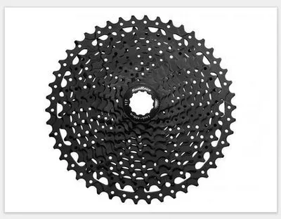 A black bicycle cassette is shown against a white background.