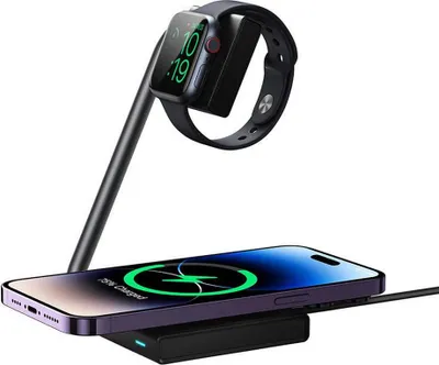 A black charging stand with a smartphone and an Apple Watch on it, against a white background.