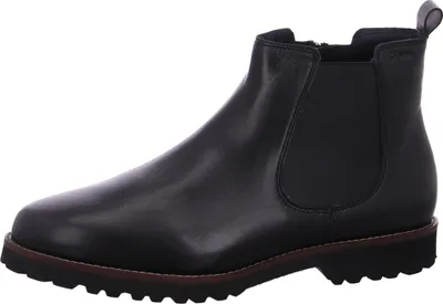A black leather Chelsea boot is shown from the side against a white background.