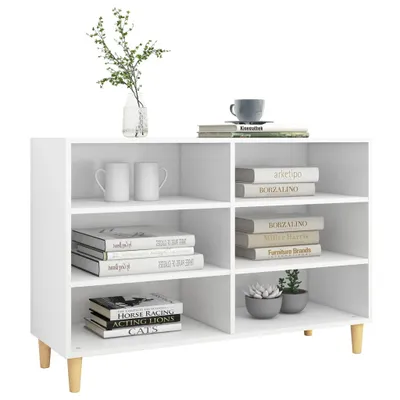 A white bookshelf with items on display, including books, mugs, plants, and a coffee cup.