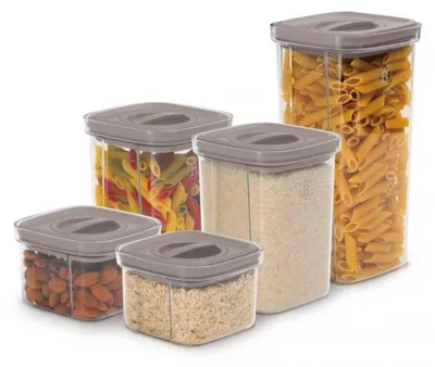 A set of five clear plastic food storage containers with gray lids, filled with various food items like pasta, rice, and almonds.