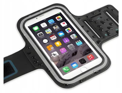 A close-up shot of a smartphone in a black armband holder.
