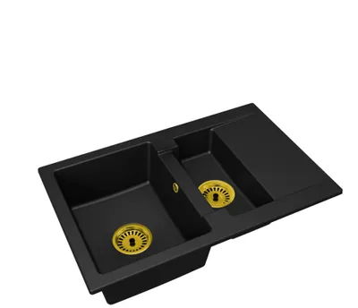 A black double-basin kitchen sink with gold drains, shown from a diagonal angle against a white background.