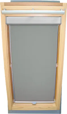 A roller blind installed in a wooden framed skylight.