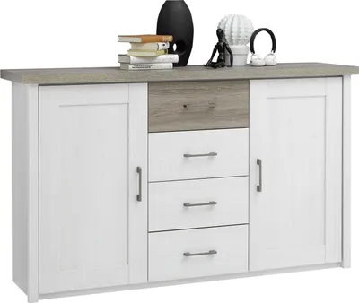 A white and gray sideboard with decorative items on top.