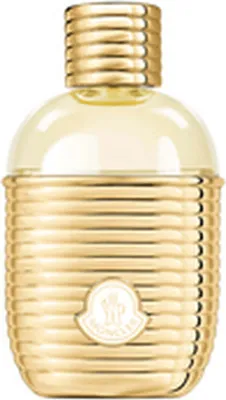 A gold-colored perfume bottle with a ribbed texture and a white Moncler logo.
