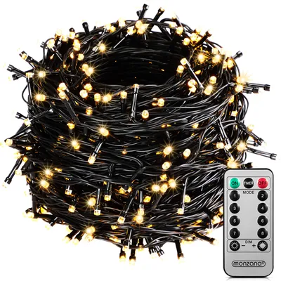 A coiled string of warm white LED lights with a remote control.