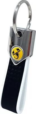 Obrázok produktu pre Oficiálne kľúčenky Abarth, biele a karbónové, s žltým emblémom skorpióna