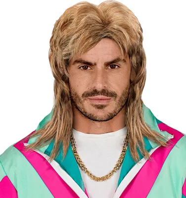 A man wearing a blond mullet wig and a colorful 80s-style jacket, with a gold chain.