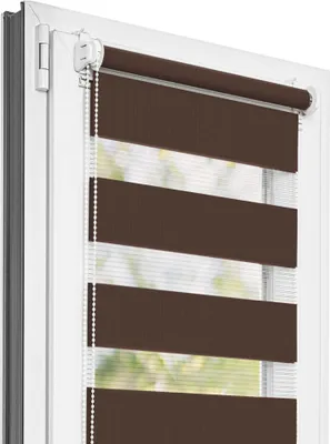 A close-up view of a brown and white striped roller blind installed in a white window frame.