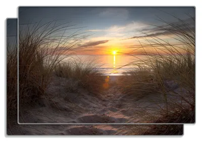 Produktbild von Wallario Frühstücksbrettchen 2er Set aus Glas, je 20 x 30 cm, mit rutschfesten Füßen, Motiv Sonnenuntergang am Strand