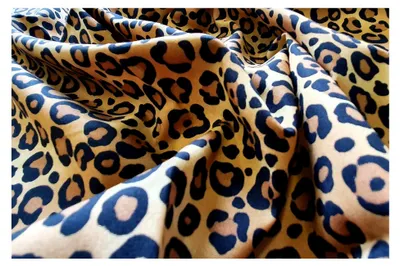 Produktbild von Stoff mit Leopardenmuster, 110 cm, 100 % Baumwolle, Popeline, 130 g/m²