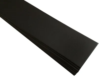 A stack of black decorative foam panels.