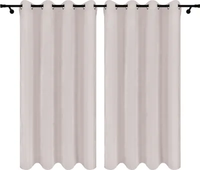 Two cream-colored velour curtains with grommets hang on a black curtain rod against a white background.