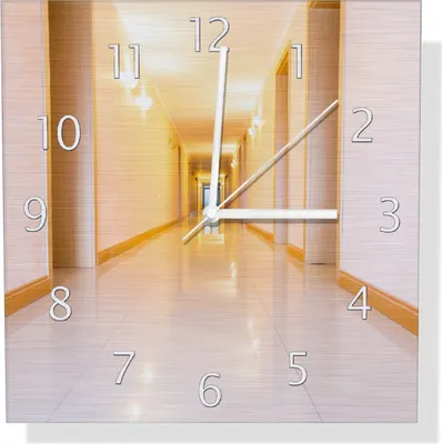 Produktbild von Wallario Design Wanduhr Strahlend sauberer Flur mit goldenem Licht und weißen Wänden aus Aluverbund, Größe 30 x 30 cm