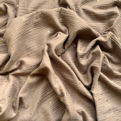 Produktbild von Musselin double gauze hellbraun (Light Brown) mit goldenen Sternen