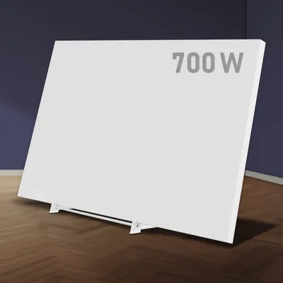 A white infrared heater with a stand is shown in a room with dark blue walls and a wooden floor.
