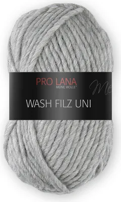 A ball of grey yarn with a black label wrapped around it.